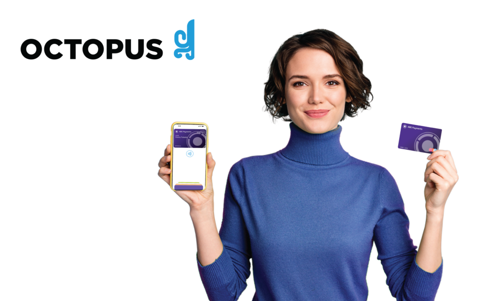 Woman holding both physical card and digital version